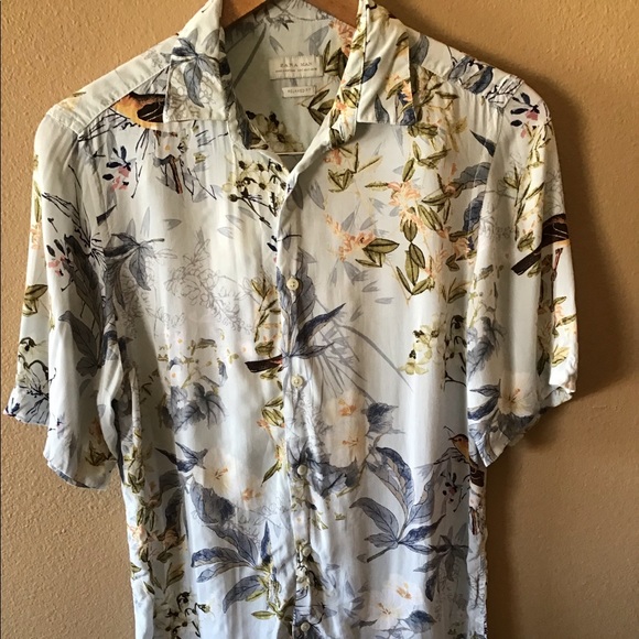 رجس مجلة قابس كهرباء parrot shirt zara 